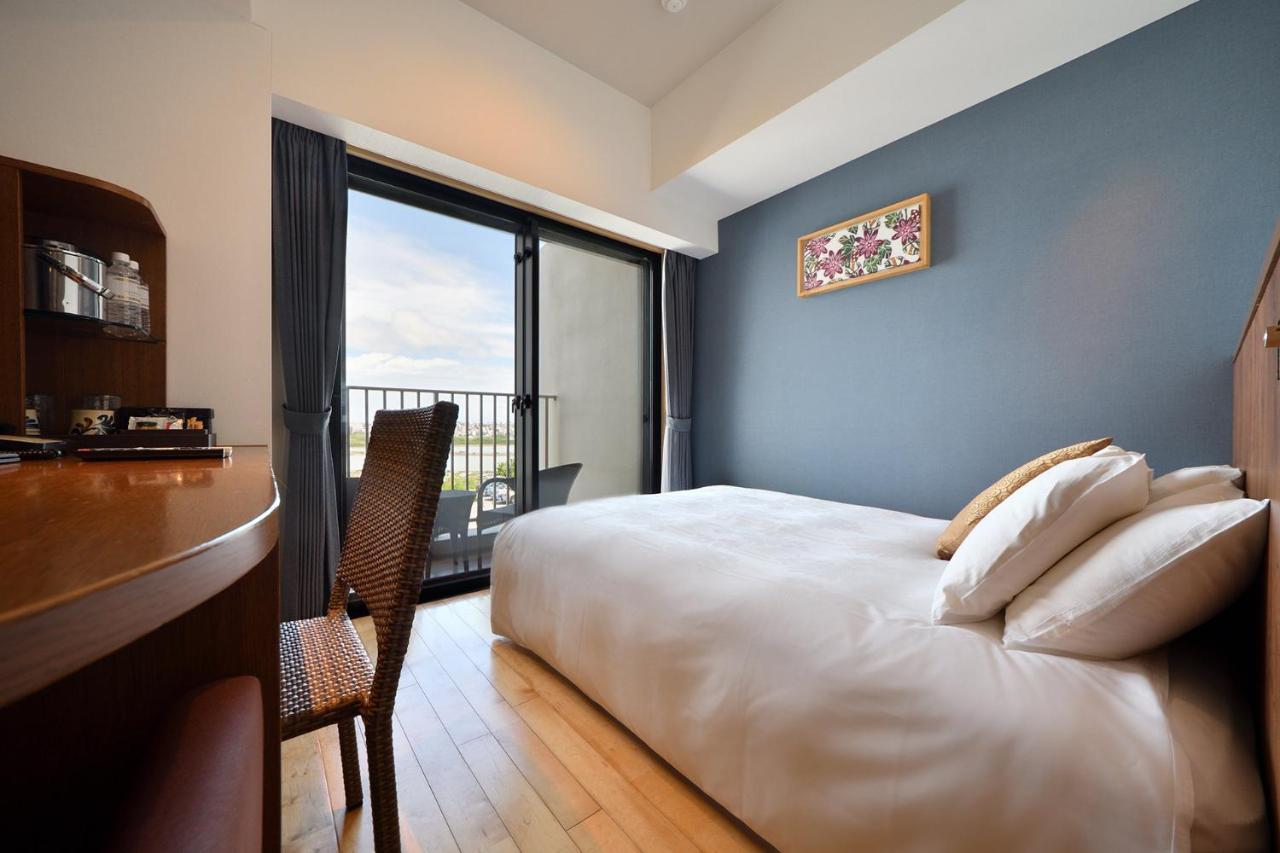 Senagajima Island Resort & Spa Tomigusuku Habitación foto